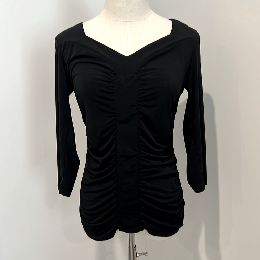 Very flattering black sexy blouse